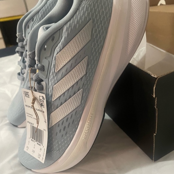 Adidas' Light Blue and White Sneakers - Picture 3 of 11